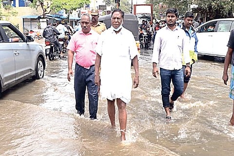 Chief Minister V Narayanasamy inspecting rain-hit areas in Puducherry on Sunday