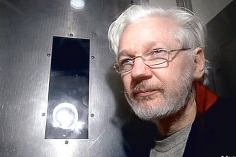 Understanding dual identities of Assange