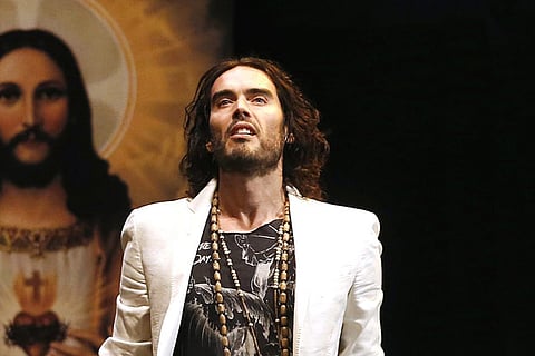 Russell Brand's wife finds his energy levels exhausting