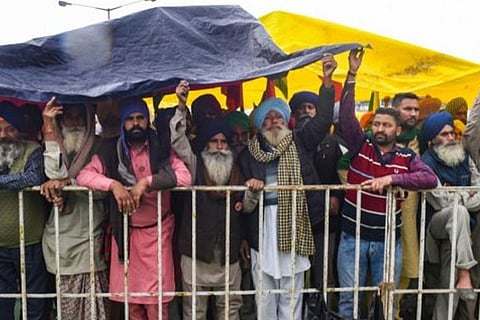 Firm on their demands, farmers brave cold, rains as talks with govt remain deadlocked