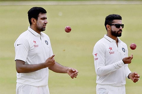 Ravichandran Ashwin (right) with bowling coach Bharat Arun