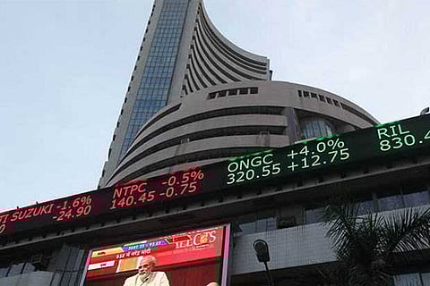 Sensex slips over 100 pts in early trade, Nifty tests 14,450