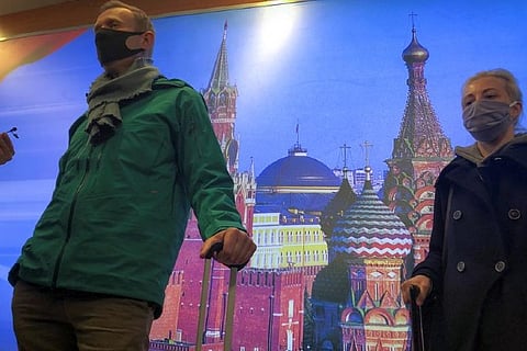 Russian opposition leader Alexei Navalny and his wife Yulia Navalnaya meet with journalists