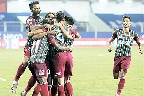 ATK Mohun Bagan players celebrate the winning goal