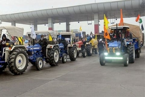 File photo: PTI; Farmers gearing up for tractor rally