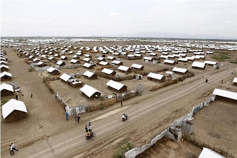 File photo: Reuters; Refugee camp
