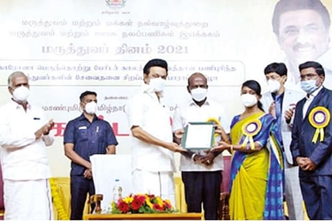 Chief Minister MK Stalin presenting a certificate of merit to The Nilgiris Collector Innocent Divya