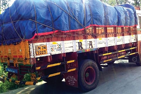 One of the three lorries seized by police for transporting paddy from other districts into Thanjavur
