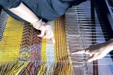 A Pattamadai mat in the making