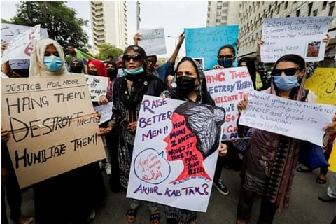 A glimpse of demonstrators carrying out a rally against Noor's murder (Credit: Reuters)
