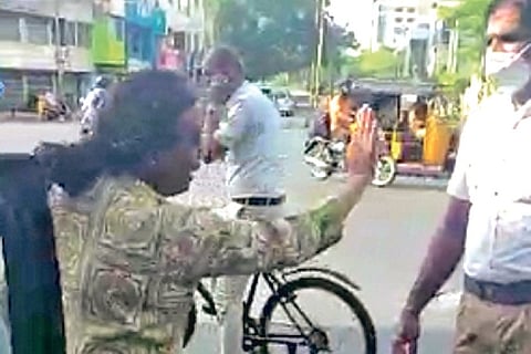 The accused woman advocate seen shouting at police in this video grab which has gone viral