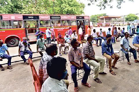 MTC drivers and conductors waiting to get vaccinated at Alandur bus depot on Wednesday