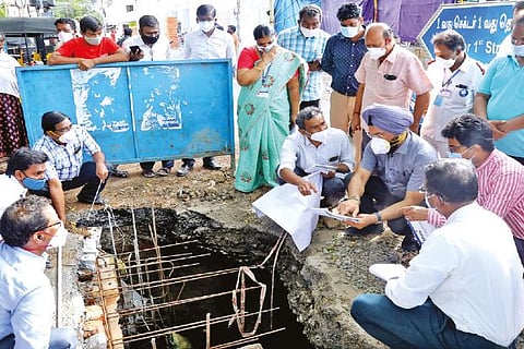 Corporation Commissioner Gagandeep Singh Bedi and other officials inspecting a storm water drain in