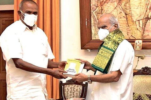 Assembly Speaker M Appavu inviting Governor Banwarilal Purohit at Raj Bhavan on Friday