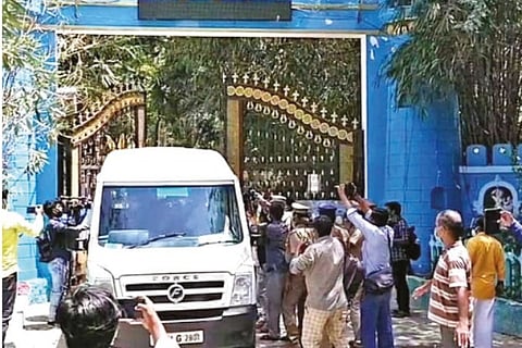 Siva Sankar Baba?s devotees waiting at the school to see him