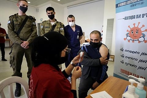 Palestinian hospitals fill up as Israel loosens COVID-19 restrictions
