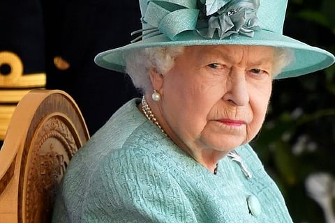 Queen Elizabeth says saddened by Harry and Meghan's experiences