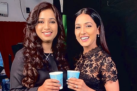 Neeti Mohan and Shreya Ghoshal.