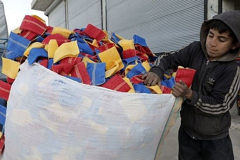 Born into conflict, 10-year old Syrian child is family's breadwinner