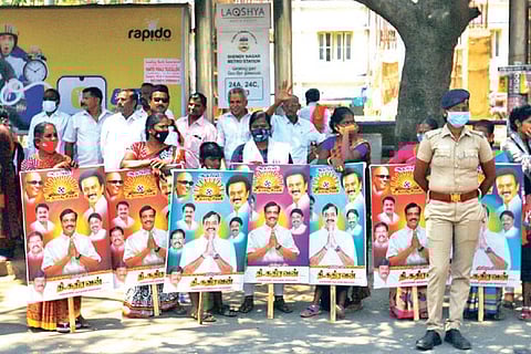 DMK supporters wait outside as Stalin files his papers