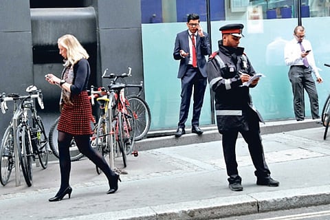 Phone-gazing while walking, act of an agent of chaos