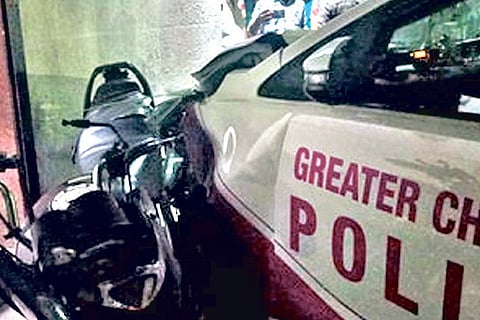 The mangled front of the Pink vehicle