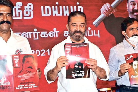 MNM chief Kamal Haasan releasing the manifesto in Coimbatore