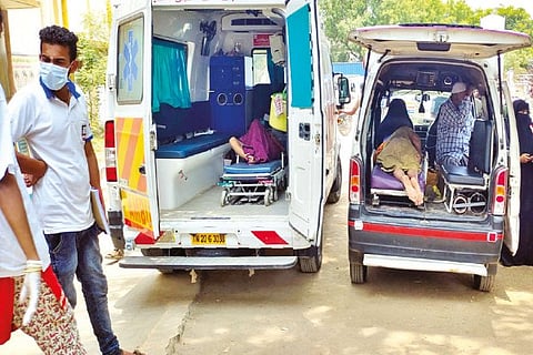 COVID patients waiting in ambulances outside the government hospital in Tirupur on Monday