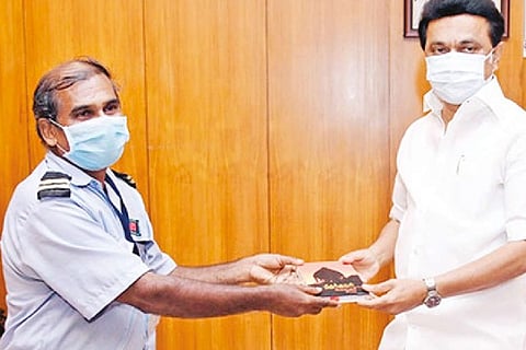 CM Stalin presenting a book to Thangadurai.