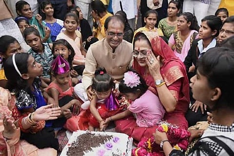Madhya Pradesh CM Shivraj Singh Chouhan with orphaned children (Photo: PTI)