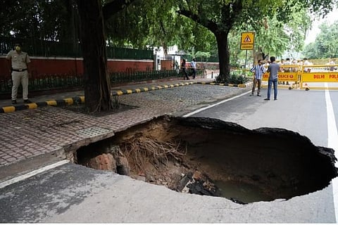 Road caves in, house collapses due to rain in Delhi