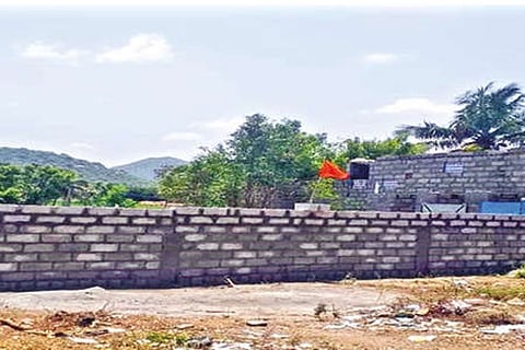 The controversial wall before being demolished by officials near Pernambut on Thursday