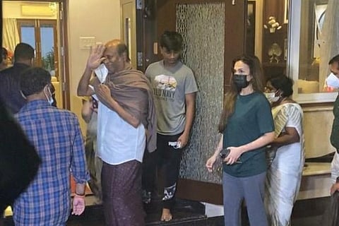Rajinikanth with his daughter returning from Hospital