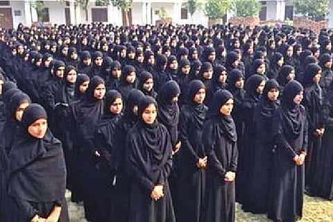 The purported image of girls seeking cancellation of degree certificates.