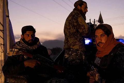 Taliban security guards.