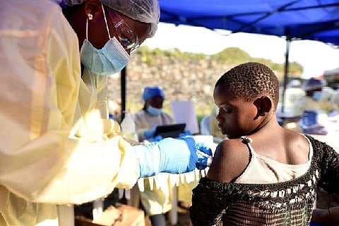 A health worker administering Ebola vaccine. File photo: Reuters