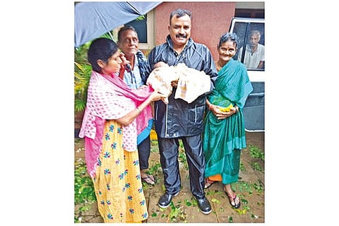 Rescued baby handed over to her mother