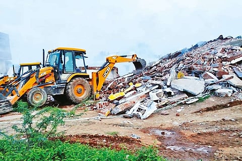 Debris being cleared from blast site of building where cracker was stored illegally in Sivakasi