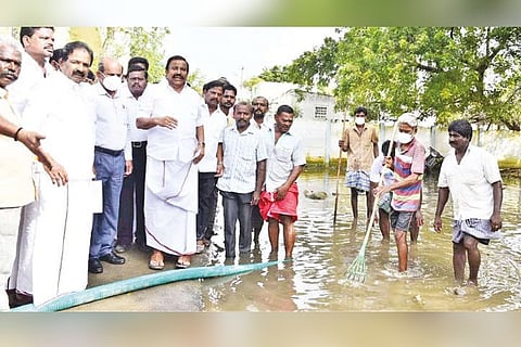 Minister KN Nehru inspects process to drain out water from a residential area in Tiruchy on Tuesday