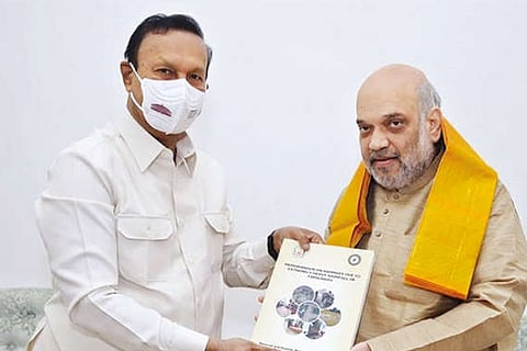 TR Baalu submitting a memorandum for funds to carry out rain relief works in TN to Amit Shah