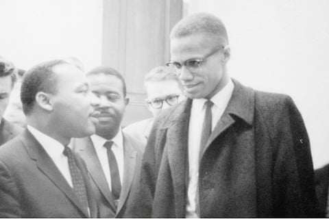 Malcolm X (R) with Martin Luther King Jr. (L)