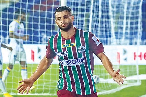 Hugo Boumous celebrates after scoring the opening goal