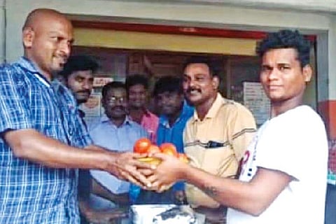 A customer buying biryani in exchange for 1kg tomato