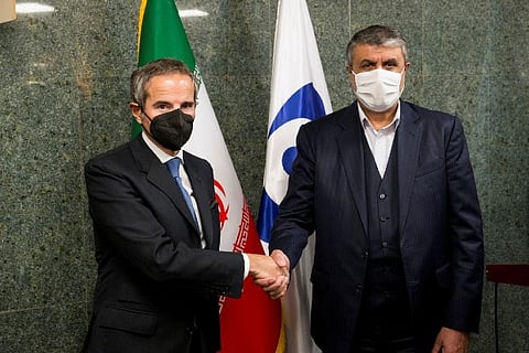 IAEA Director General Rafael Grossi and Mohammad Eslami shake hands as they meet in Iran (IANS)