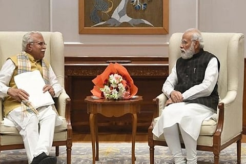 Haryana Chief Minister Manohar Lal Khattar with PM Modi (Source: ANI)