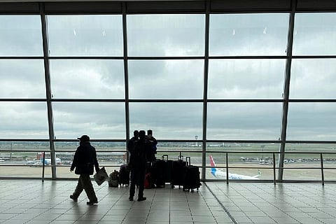 Passengers waiting for flight.
