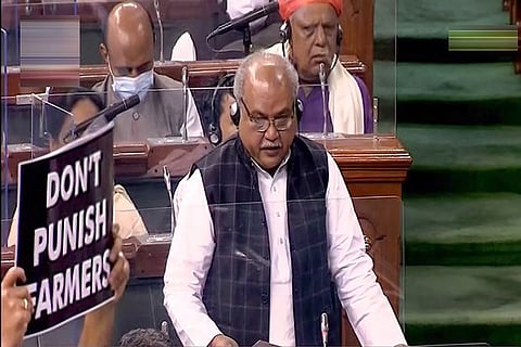 Union Agriculture Minister Narendra Singh Tomar speaks in the Lok Sabha