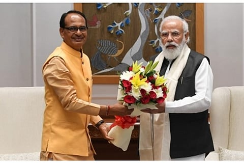 MP CM Shivraj Singh Chouhan and PM Narendra Modi (Source: IANS)