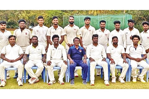 The title-winning United CC players and staff pose for a photograph