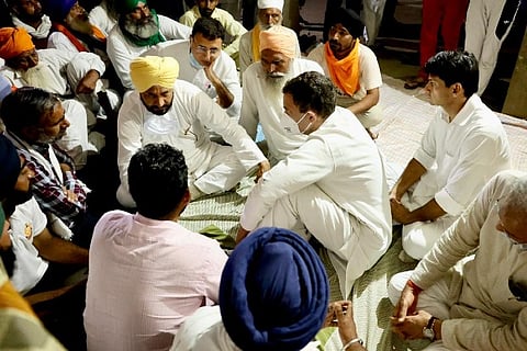Congress Leader Rahul Gandhi with family members of killed farmers